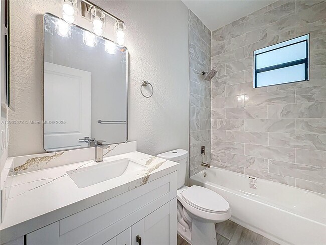 Building Photo - 410 NW 41st St