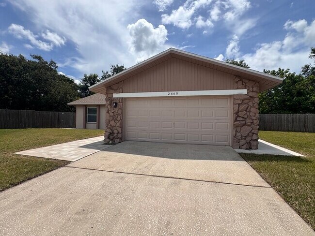 Building Photo - Fully Renovated Palm Harbor Home