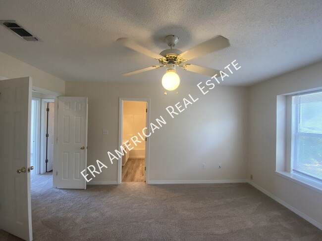 Building Photo - 7468 Woodmont Rd