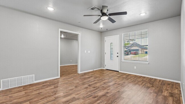 Building Photo - Charming 3 Bedroom Home +BONUS Room with Spacious Backyard