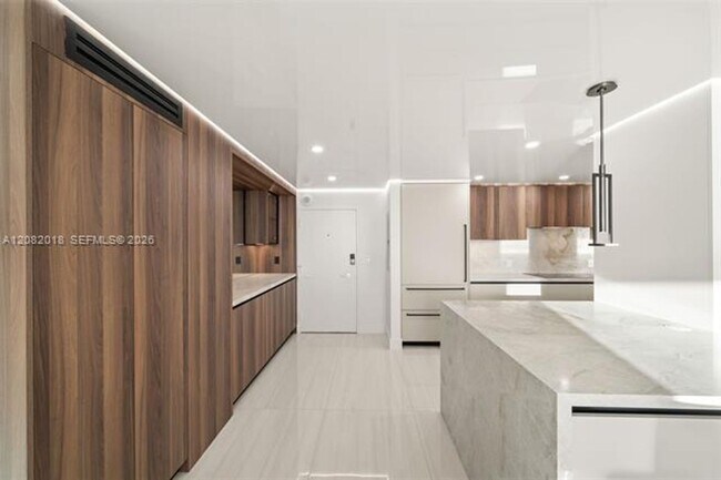 Building Photo - 5555 Collins Ave
