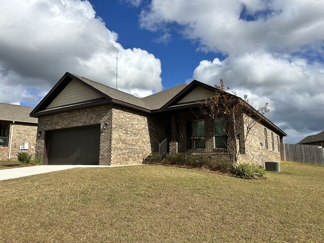 Elevated front porch with railings for safety - 31524 Plover Ct