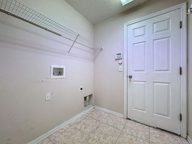 Building Photo - Poinciana single family home in Village 7,...