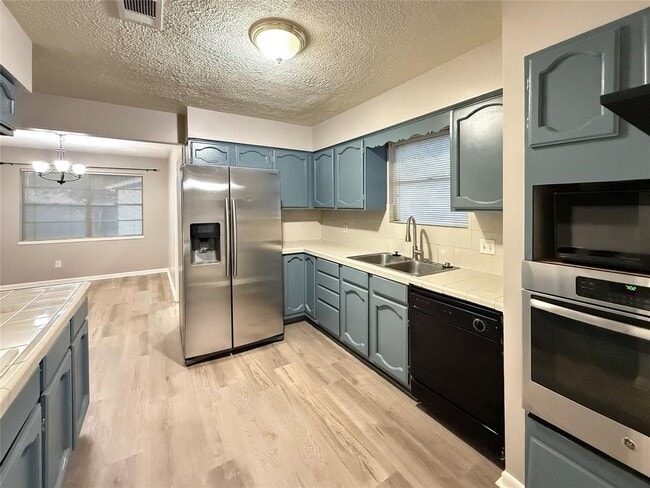 Building Photo - 9907 Windriver Dr