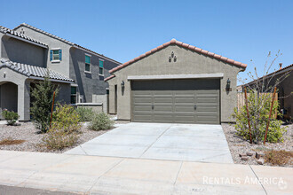 Building Photo - 40570 W Sunland Dr