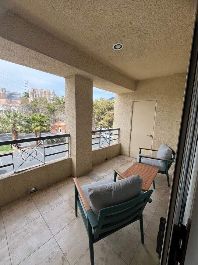 Building Photo - Meridian  Fully FURNISHED Condo with Strip...