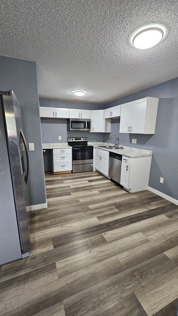 Building Photo - $1313 - 3BR/1BA Pet-Friendly 4Plex near Memorial Park in Colorado Springs