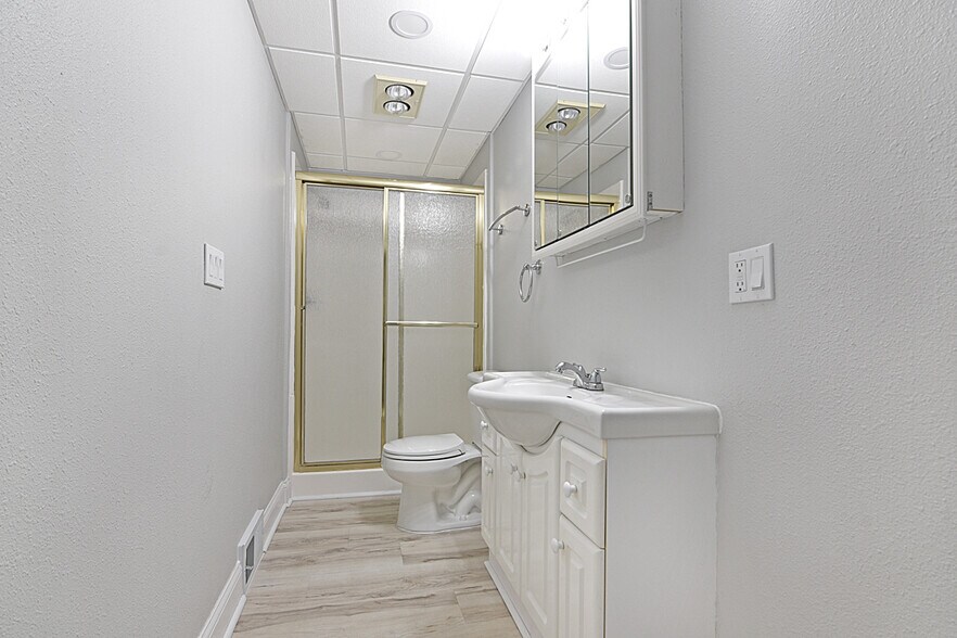 Main floor bathroom with easy access and everyday functionality. - 32584 River Vista Ln