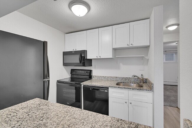 Building Photo - $1,470.95  - 2 Bedrooms, 1 Bathroom, Condo in Denver with Cozy Carpet!