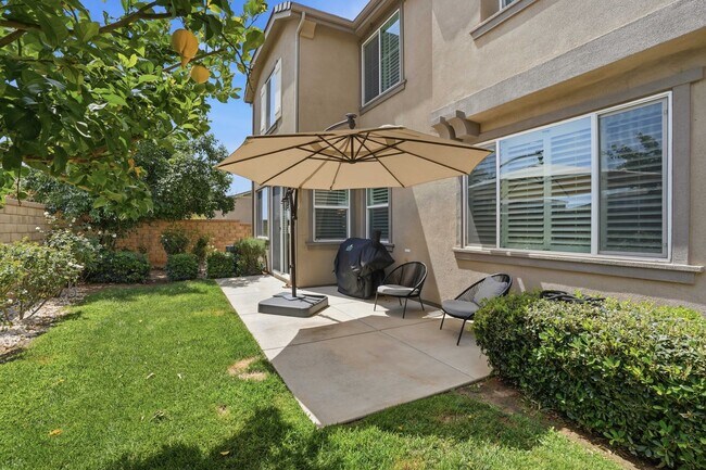 Building Photo - Highly Sought-After Next Gen Home with Private Downstairs Suite in Gated Valencia Community