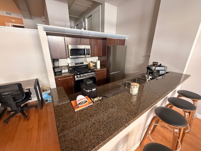 Building Photo - Industrial-Chic Loft in East Village | 1,049 Sq Ft | Gym & Rooftop