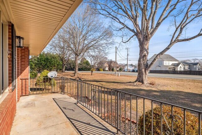 Building Photo - Elon - Large Brick Home, Hardwoods, Granite Counter-Tops, SS Appliances, Fire Place, Carport - Mu...