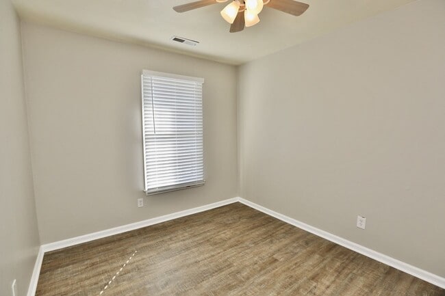 Building Photo - Updated End-Unit Brick Townhome Ready NOW!...