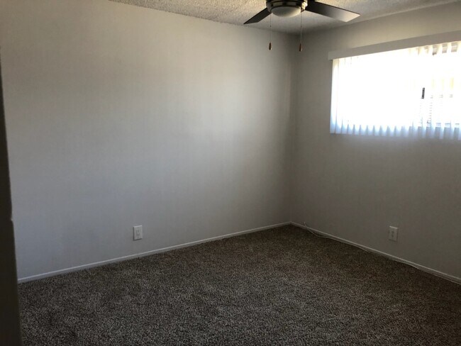 2nd bedroom w/new carpet & ceiling fan - 12531 Eucalyptus Ave
