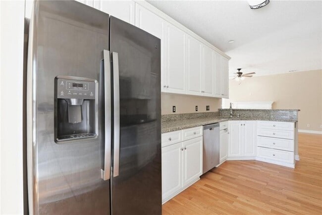 Building Photo - 4-Bedroom Home in Wild Heron with Front Porch and Fenced Yard