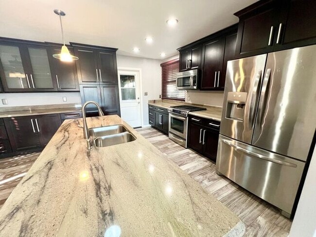 Building Photo - Charming 3BR/2BA Home with Pool, Remodeled Kitchen & Backyard Oasis