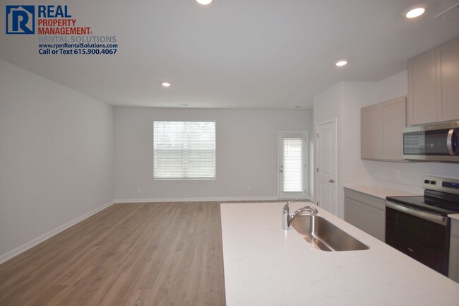 Building Photo - Brand new 3bd townhome with attached garag...