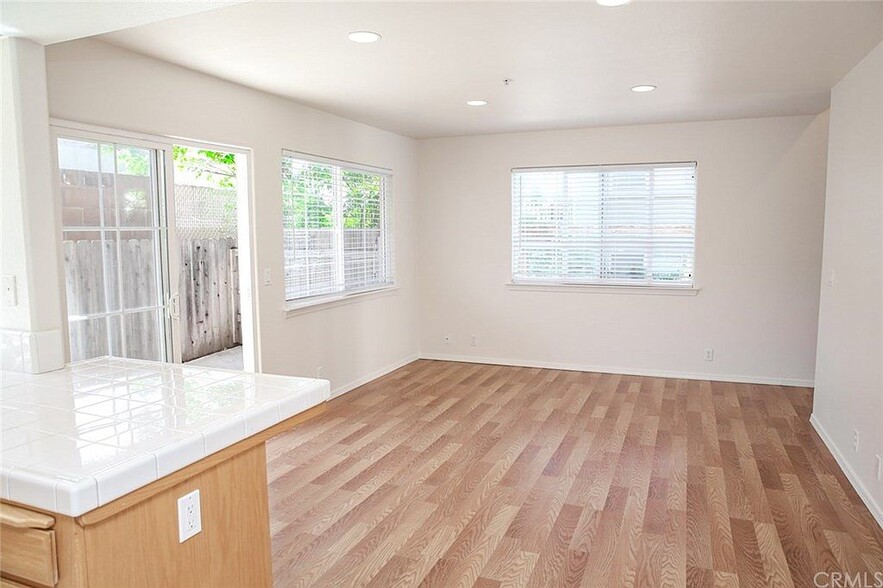 Living area with new laminate floors - 3051 Augusta St