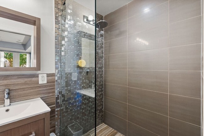 Building Photo - Stylish 2-Level Condo with Private Yard & Chef’s Kitchen Near Petworth Metro!