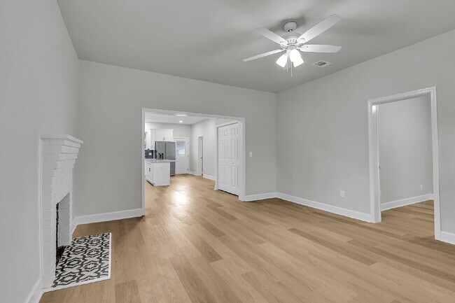 Building Photo - Cute all brick ranch on a large corner lot with fenced in yard and 1 car garage