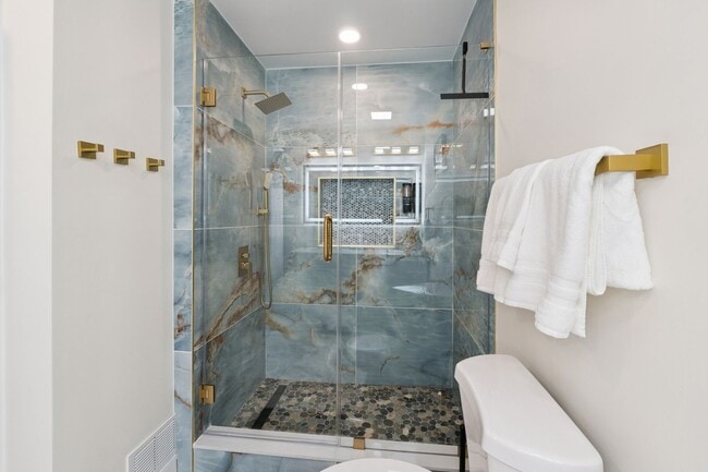 Building Photo - Fully Furnished: Beautiful 4-Bedroom Home ...