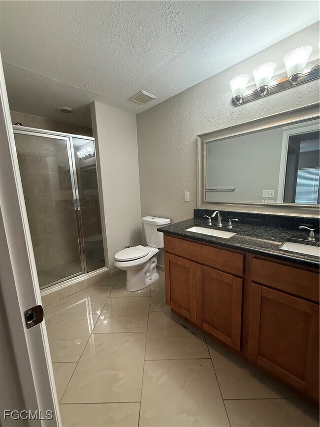 Building Photo - 8555 Bernwood Cove Loop