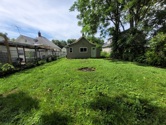 Building Photo - Two bedroom home with partially fenced yard!