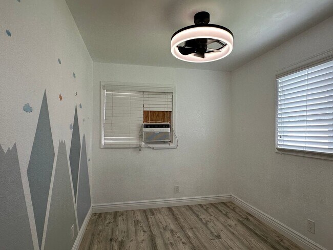 Building Photo - Mililani Town Living with PV, Tesla Batteries & EV Charger