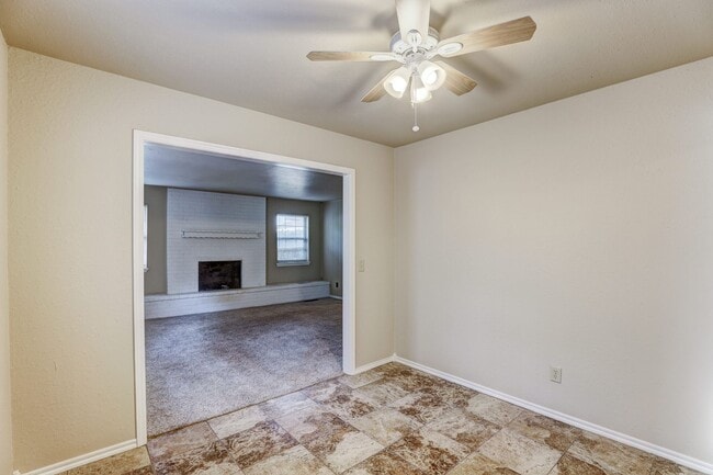Building Photo - 4 Bedroom,2.5 Bath and 2 Car Garage Duplex with Fireplace and Prime Location Near Lake Hefner