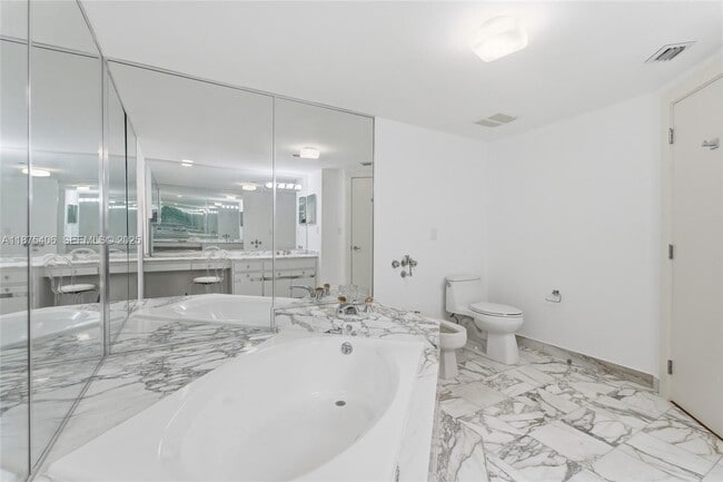 Building Photo - 10155 Collins Ave