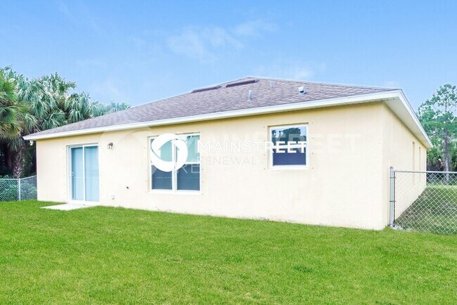 Building Photo - 4 Bedroom Pet-Friendly Home in PALM BAY, FL with Main Street Renewal