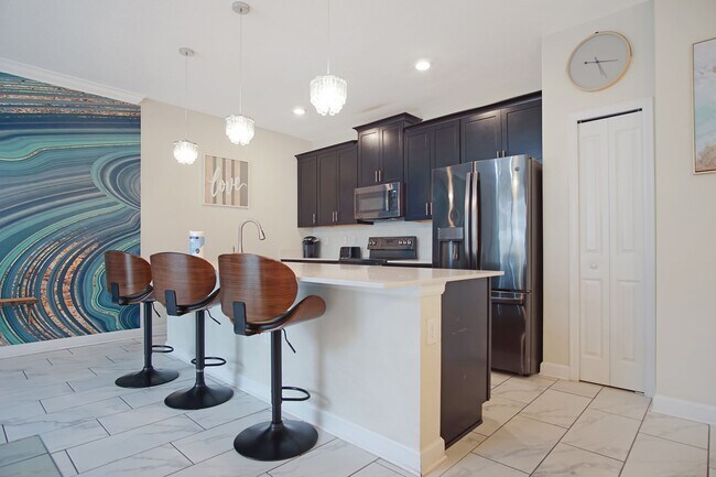 Building Photo - Pool Townhome Now Available