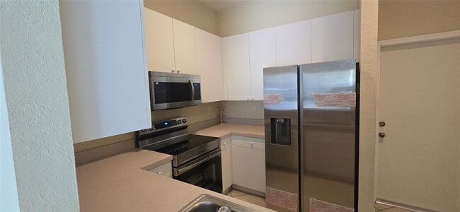 Building Photo - 8314 Lagos De Campo Blvd