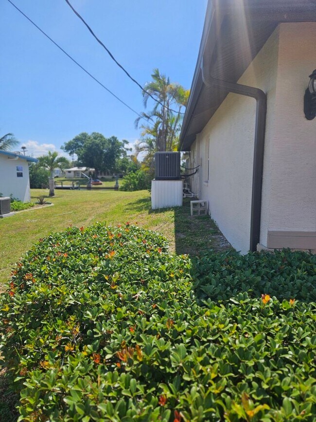 Building Photo - Port Charlotte Waterfront salt water pool annual rental