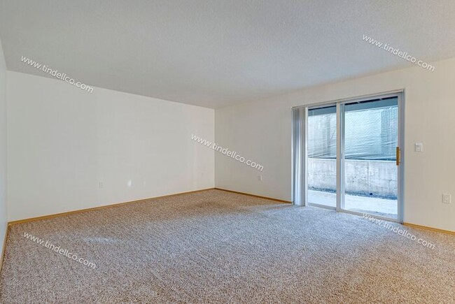 Building Photo - Spacious Pet-Friendly Ground Level Unit w/...