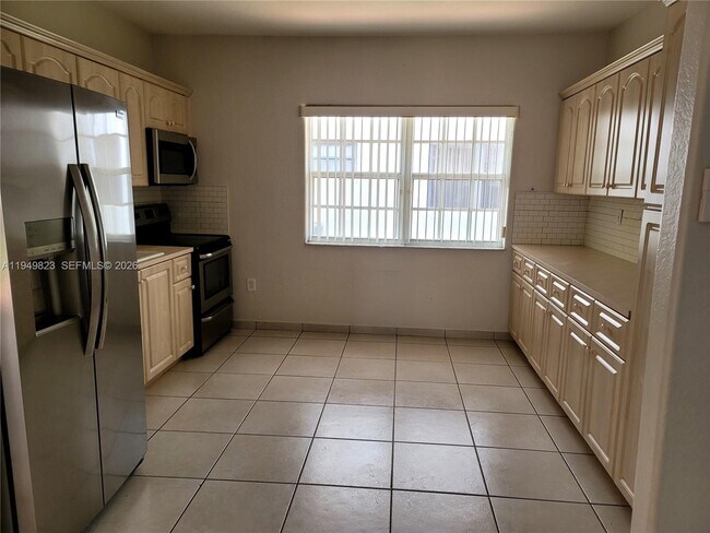 Building Photo - 7567 N Augusta Dr