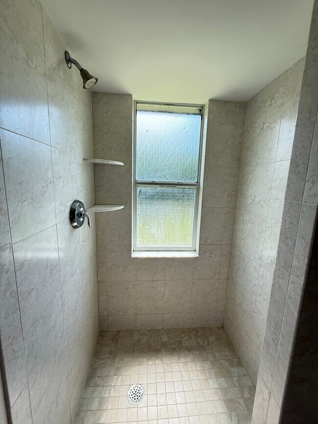 Building Photo - 2/2 with Fenced Yard, Garage and Laundry, Available Now!