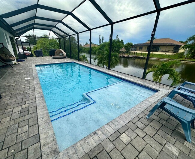 Building Photo - Fully Furnished Annual Rental- 3 Bedroom 2 Bathroom - Pool and Waterfront- NE CAPE CORAL