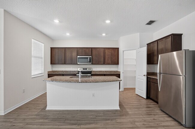 Building Photo - 6170 Dolostone Dr