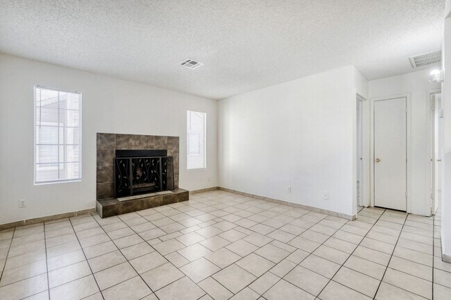 Building Photo - Move-In Ready 2-Bedroom with Cozy Fireplace!
