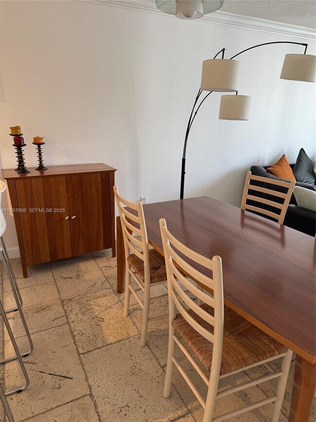 Building Photo - 5701 Collins Ave