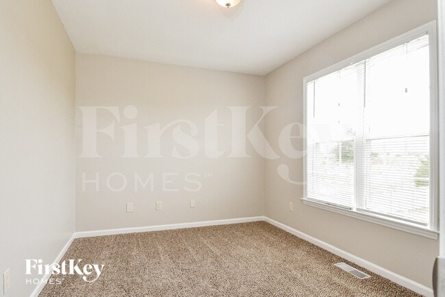 Building Photo - 6033 Old Plank Rd