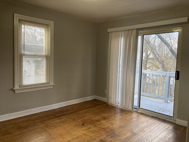 Master bedroom with private balcony - 8805 Tyrell Dr