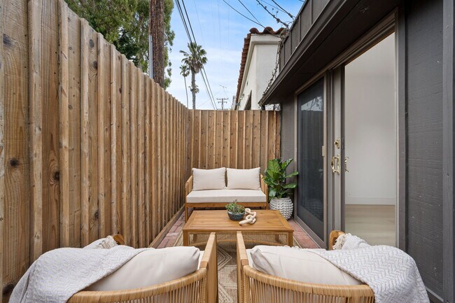 Cozy outdoor patio with entry to both downstairs bedrooms - 518 Euclid St