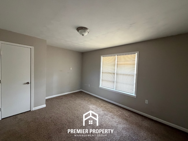 Building Photo - Spacious 4BR/2BA Home in Bartlett Cove | Brick Fireplace & Formal Dining