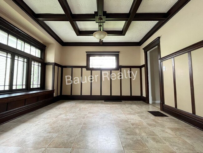 Building Photo - Three bedrooms, one and a half baths