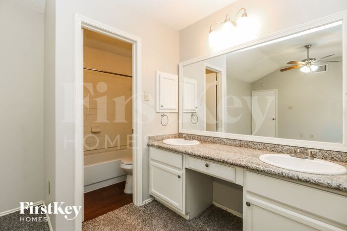 Building Photo - 6027 Woodmancote Dr