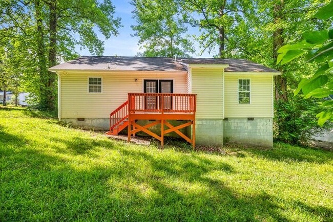 Building Photo - NW Home - Updated Kitchen and Bathrooms, Wood Laminate Flooring, Deck, Must See!