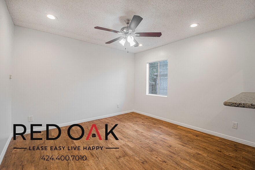 Building Photo - 1309 W 36th Pl