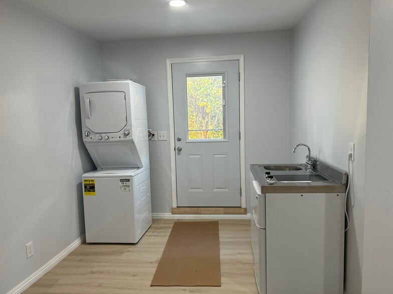 ,Washer and dryer and kitchenette inside unit - 6008 Damask Ave